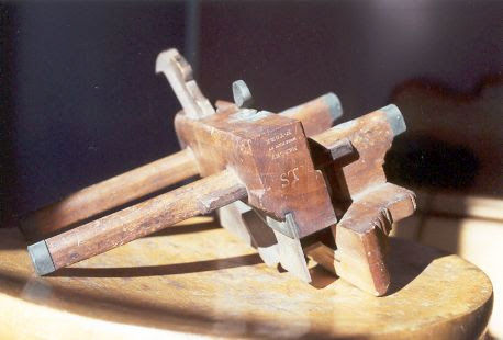 Samuel Thomson's molding plane with the burned-in initials S.T.